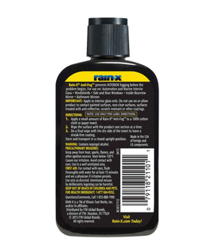 Back label of Rain-X Anti-Fog Interior Glass Treatment bottle showing application instructions, safety warnings, barcode, and product information for automotive windshield and window fog prevention.